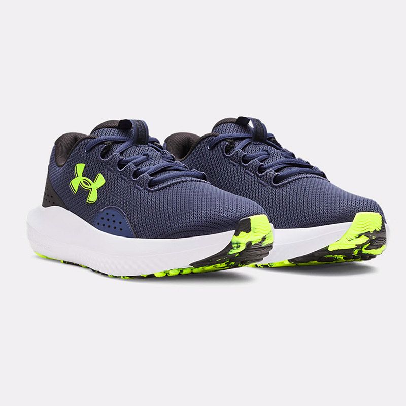 Men's navy Under Armour shoes with yellow logo from O'Neills.