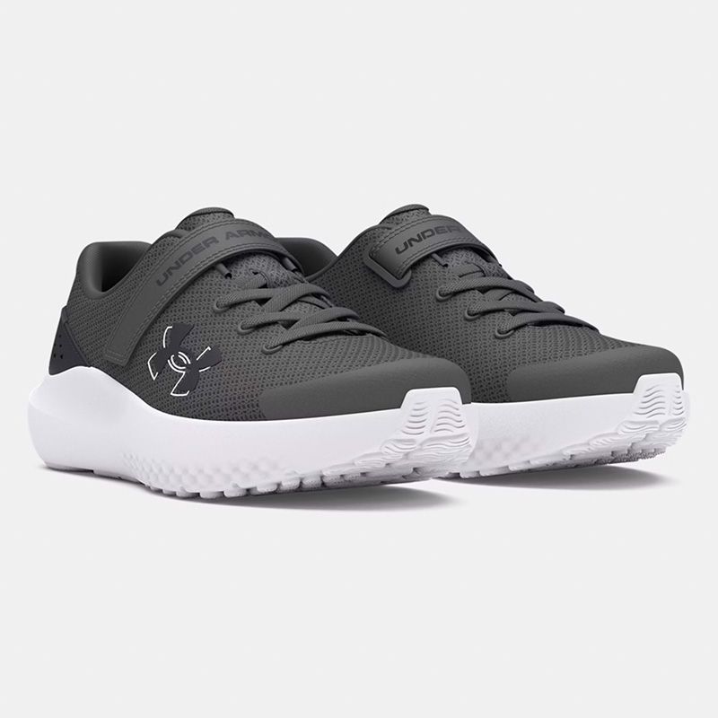 Grey black and white Under Armour Kids' UA Surge 4 AC Junior Running Shoes from O'Neills