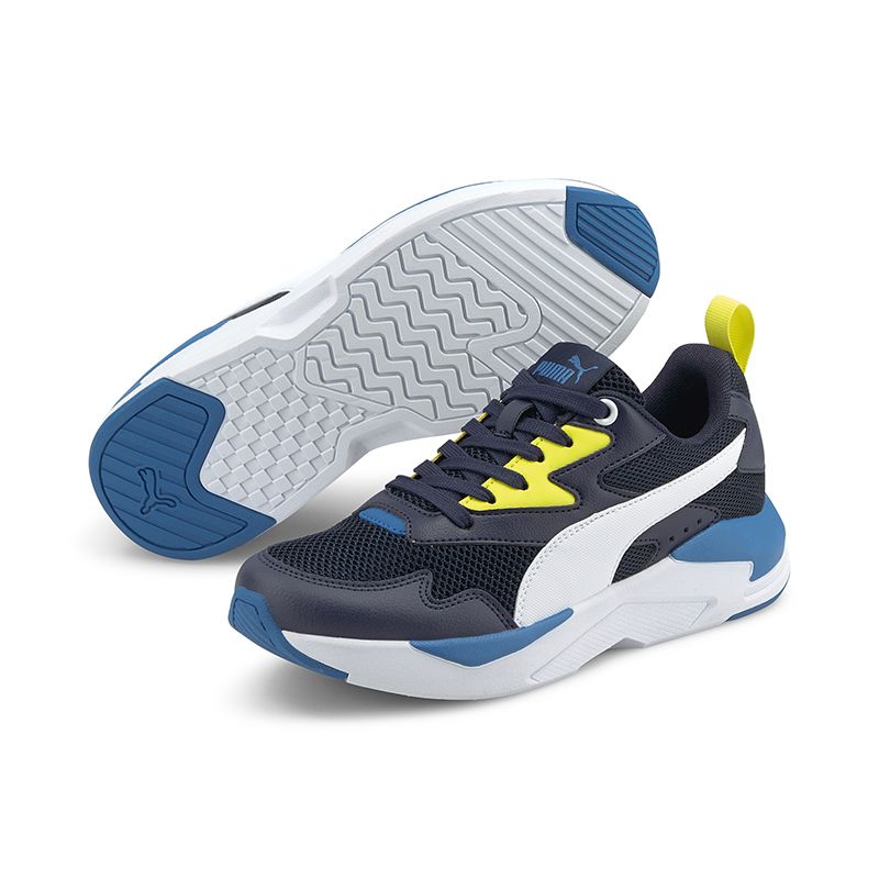 navy, yellow and blue Puma kids' runners with a low boot and a refined upper from O'Neills