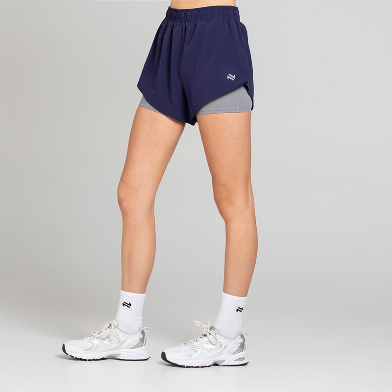 Navy / Grey Women's Finesse 2 in 1 Training Shorts from O’Neills with built in undershorts for extra coverage and support.