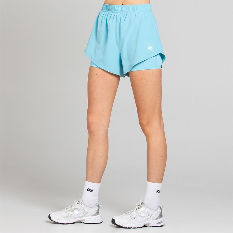 Blue Women's Finesse 2 in 1 Training Shorts from O’Neills with built in undershorts for extra coverage and support.