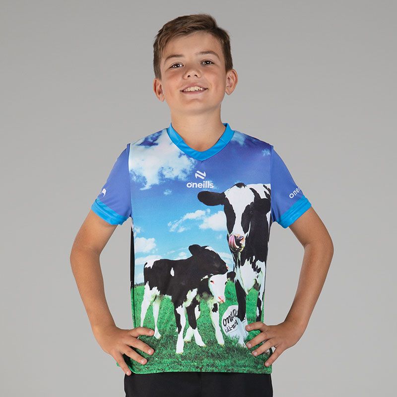 Kids’ Pasture Bedtime O’Neills ploughing jersey with image of black and white Friesian Cows and O’Neills ball.