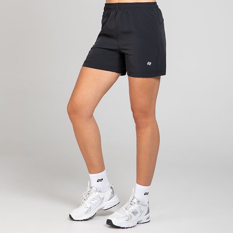 Black Women Eris 6” Woven Shorts from O’Neills Sportswear featuring two zipped pockets!