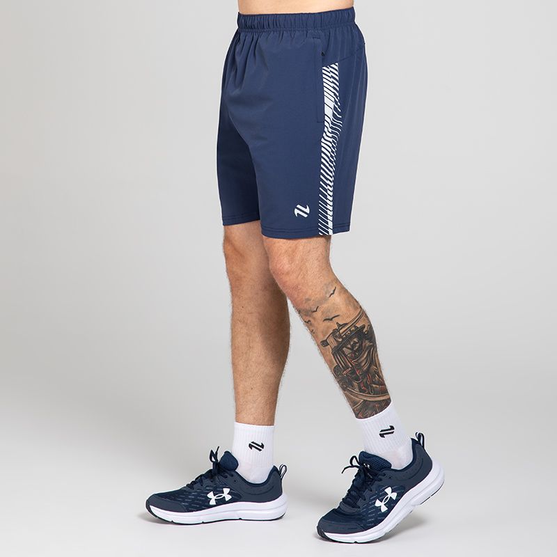 Navy Men’s Ignite Training Shorts with Grey print design and two zip pockets by O’Neills.