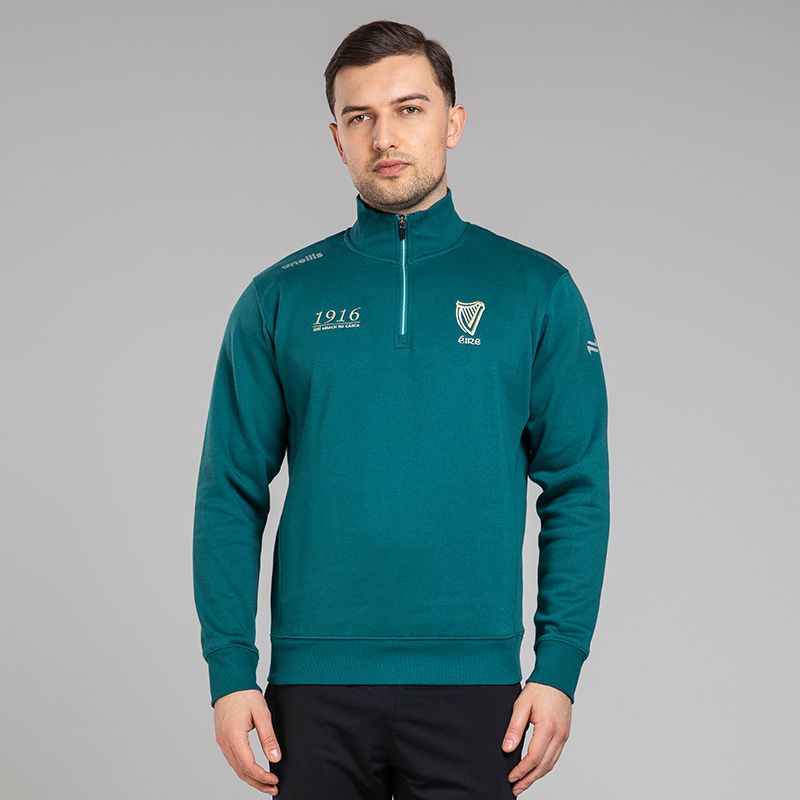 Green Men’s Evolve Fleece half zip top with 1916 and Éire embroidery by O’Neills.