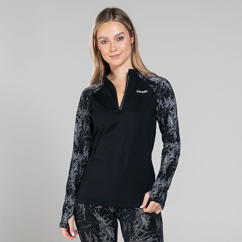 Black women’s reflective half zip top with reflective camouflage design on the sleeves by O’Neills. 