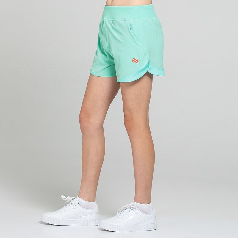 Green Girls’ Ember Training Shorts with zipped pockets and a drawcord waistband