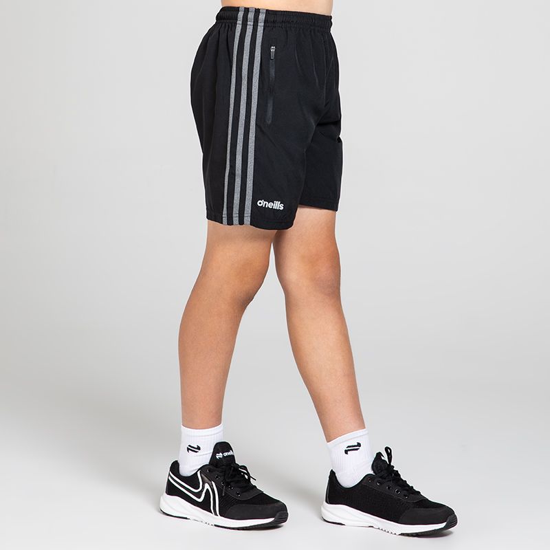 Black Kids' O’Neills shorts with pockets and stripes on the sides by O’Neills.
