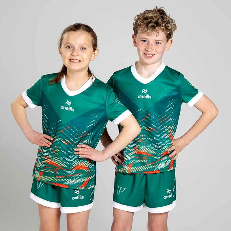 Green Kids’ Volt Summer Sets with matching jersey and shorts by O’Neills.