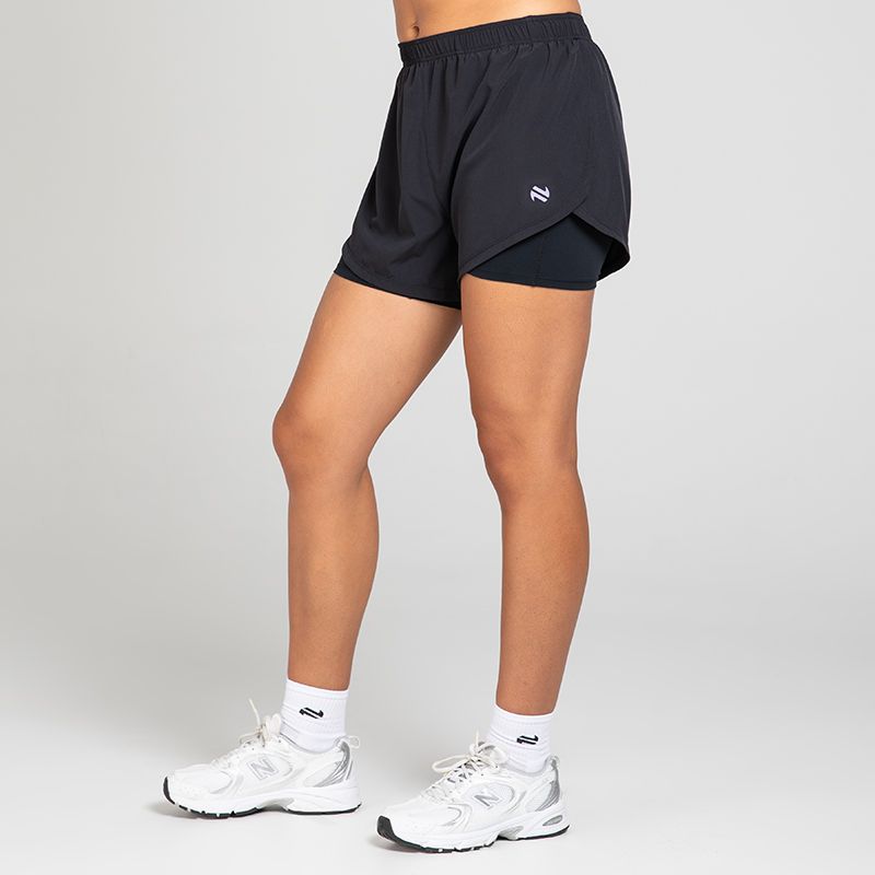 Black Women's Finesse 2 in 1 Training Shorts from O’Neills with built in undershorts for extra coverage and support.