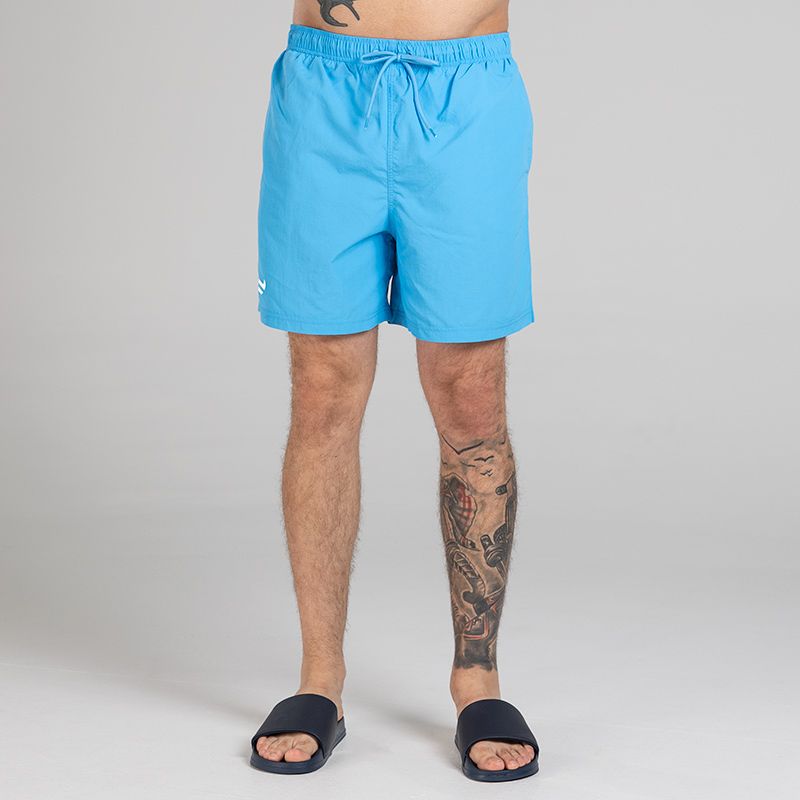 Blue Bay Swim Shorts with two side pockets and inner mesh lining by O’Neills. 