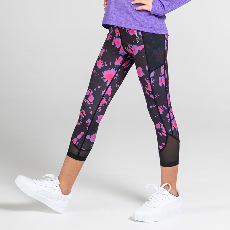 Girls black 7/8 leggings with mesh detail and pink and purple tie dye print by O'Neills.