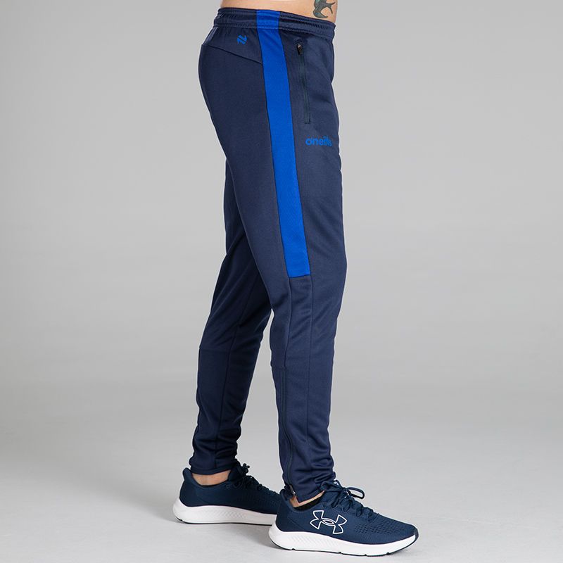 Marine / Royal Aspire Skinny Tracksuit Bottoms with two zip pockets by O’Neills.