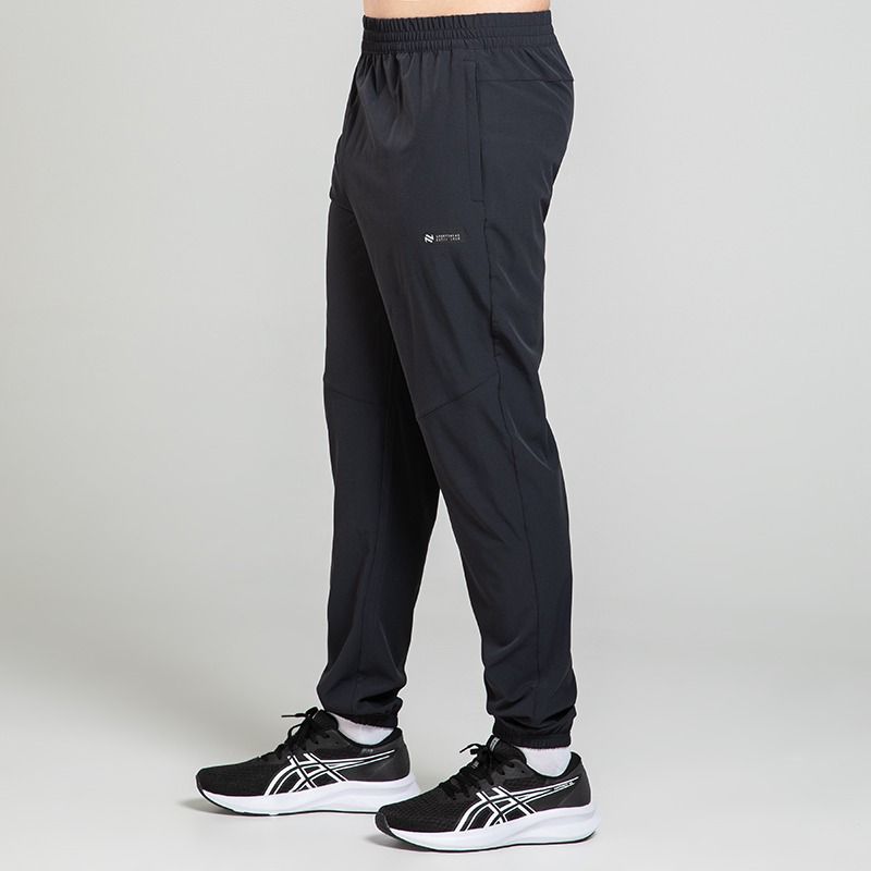 Black O’Neills Men’s Tempus Woven Tracksuit Bottoms with a drawcord waistband and zip pockets