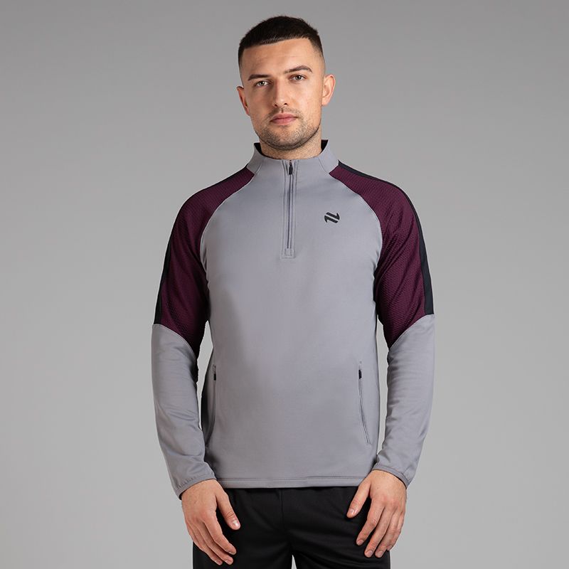 Grey Men’s Adapt Half Zip Top with two zip pockets by O’Neills. 