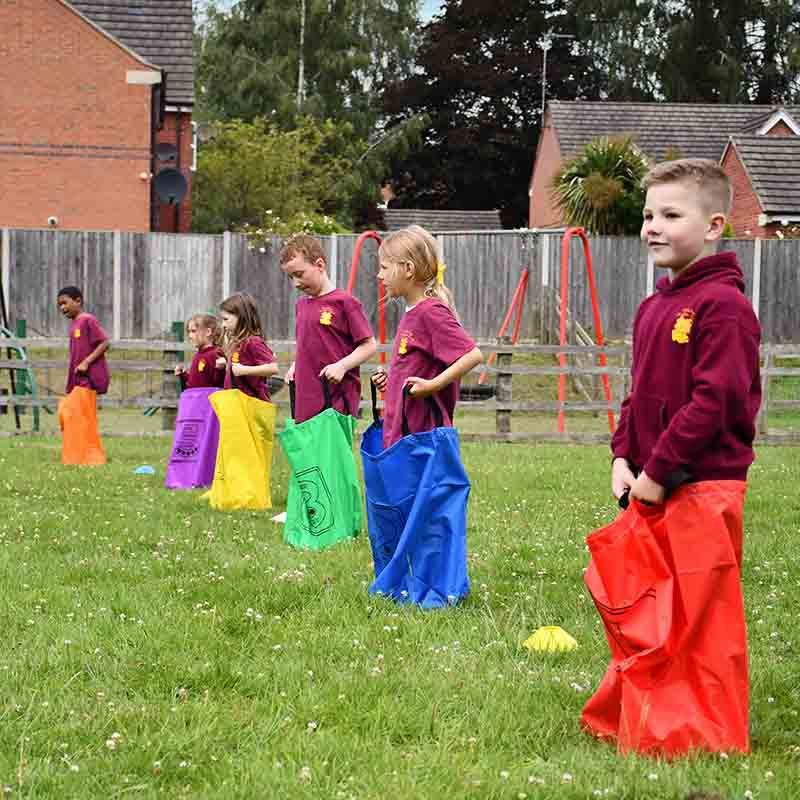 Multi coloured numbered jumping sacks with two side handles from O'Neills