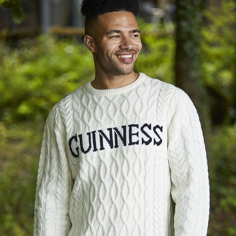 White Guinness Men's Aran Knit Jumper from O'Neill's.