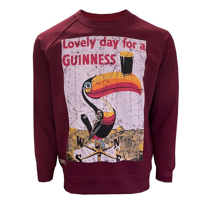 Maroon Guinness Men's Lovely Day For A Guinness Print Sweatshirt with a knitted rib cuff and waist detailing from O'Neill's.