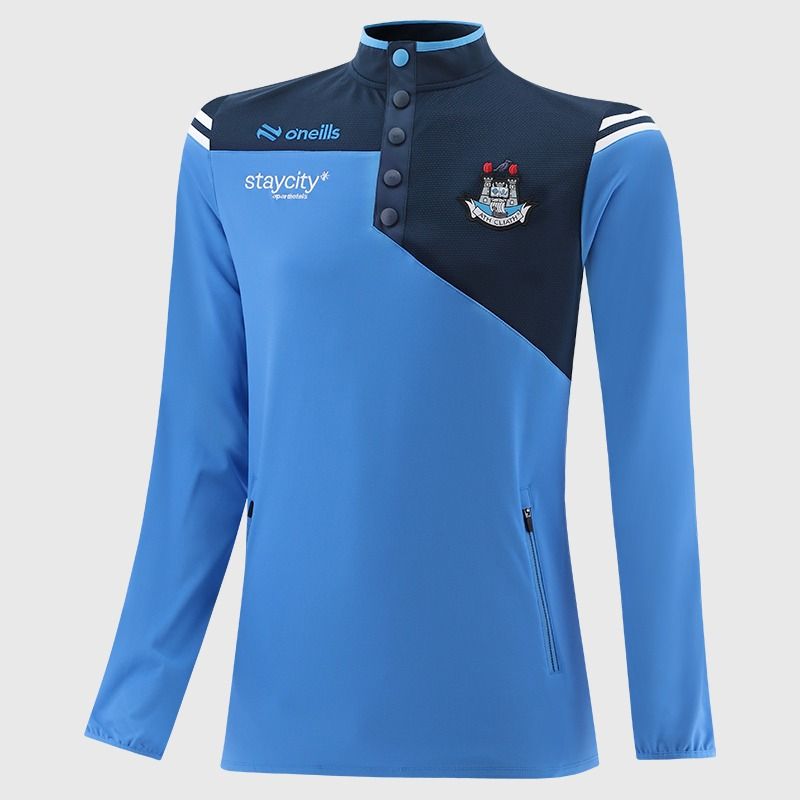 O’Neills Dublin GAA Joyce Snap Button Top Sky with official crest