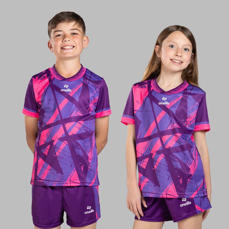 Purple / Pink Kids’ Volt Set with matching jersey and shorts by O’Neills.