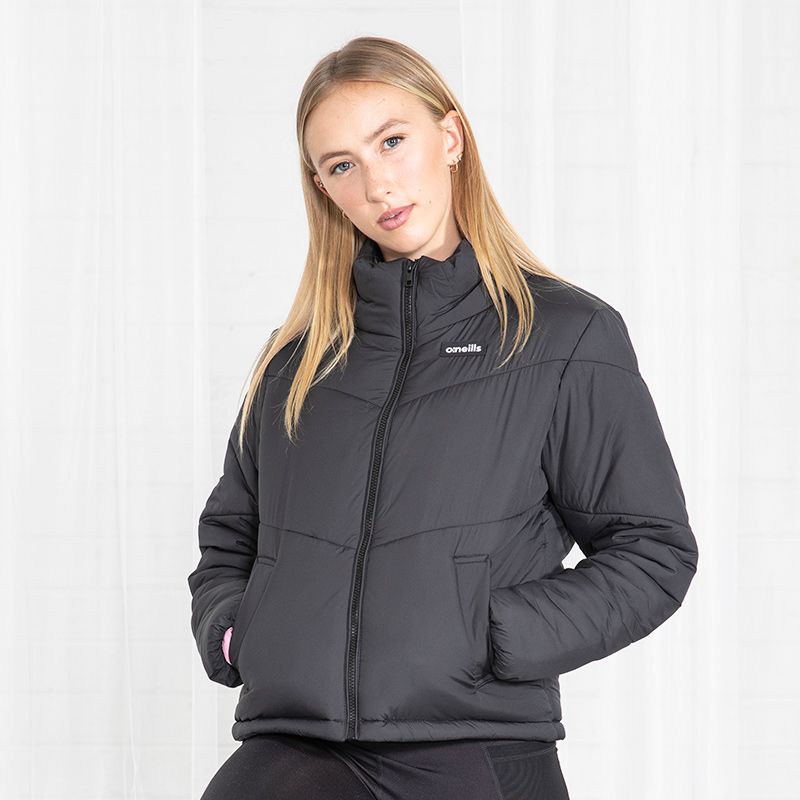 Black Women’s boxy puffer jacket with side pockets and adjustable hem with toggle by O’Neills. 