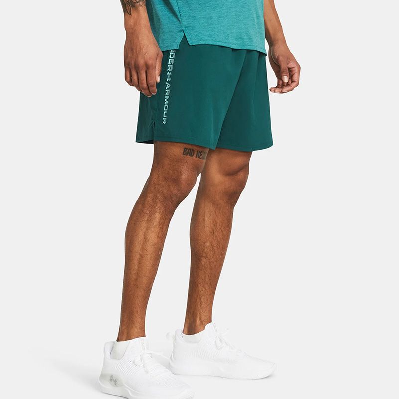 Green Men's Under Armour UA Woven Wordmark Shorts from O'Neills.