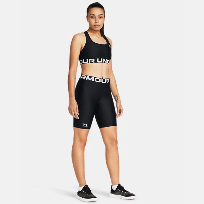 Black Under Armour Women's HeatGear® 8" Shorts with branded waistband from O'Neills.