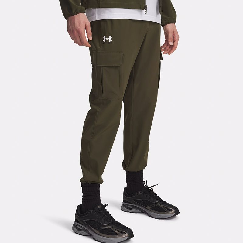 Green and white Under Armour Men's UA Vibe Woven Cargo Joggers from O'Neills