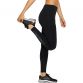Black ASICS women's full length running leggings with reflective design from O'Neills.