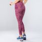 Purple women’s gym leggings with phone pockets and high waist by O’Neills.