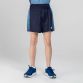 navy and blue Kids’ Rhys training shorts with zip pockets by O’Neills. 