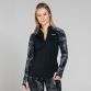 Black women’s reflective half zip top with reflective camouflage design on the sleeves by O’Neills. 