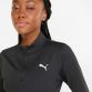 Black Puma women's quarter zip training top with branded cuffs from O'Neills.