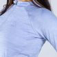 Blue women’s half zip midlayer top with shaped waist and reflective logo by O’Neills.