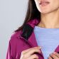 Purple women’s waterproof rain jacket with a hood and zip pockets by O’Neills.