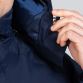 Navy Men's Touchline jacket with a high collar, detachable hood and pockets by O'Neills.