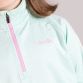 Green Nina Kids’ half zip top with brushed inner lining from O’Neills.