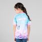 Pink Kids’ Flutter By O’Neills ploughing jersey with image of a butterfly on the front.