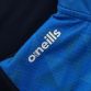 Navy Boys’ half zip midlayer top with blue print on chest and O’Neills branding on the left sleeve.