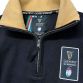 Black Guinness Men's 6 Nations 1/4 Zip Fleece with a 6 nations woven label on left breast from O'Neill's.
