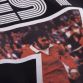 Black COPA Miss World number 7 t-shirt with George Best photo from O'Neills.