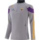 Kid's Wexford GAA Hybrid Half Zip Top with zip pockets and county crest by O’Neills. 