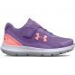 Purple Under Armour kids' trainer with velcro fastening, a cushoned midsole and a rubber outsole for added grip and traction.