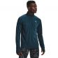 Blue Under Armour men's half zip training top with vertical Under Armour printed wordmark from O'Neills.