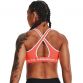 Orange Under Armour women's sports bra with crossback design from O'Neills.