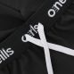 Black kids woven shorts with side pockets and a printed design and logo on the left leg by O’Neills.