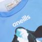 Blue Kids’ Friesian Cool O’Neills ploughing jersey with image of a cow and O’Neills ball on the front.