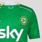 Green Kids' Castore Republic of Ireland jersey with Sky sponsor on the front and Éire on the upper back from O'Neills.