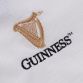 White and Black Guinness Men's Polo Shirt with embroidered gold harp and Notre Dame logo on the front from O'Neills.