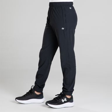 Black Kids’ Horizon Woven Tracksuit bottoms with two zip pockets by O’Neills.
